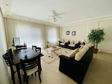 Sizeable Semi-Detached Villa For Sale In Didim – Lounge with pool and terrace access