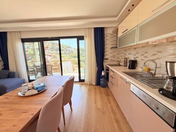 Furnished Sea-View Apartment For Sale In Bodrum – Fully fitted kitchen and dining area