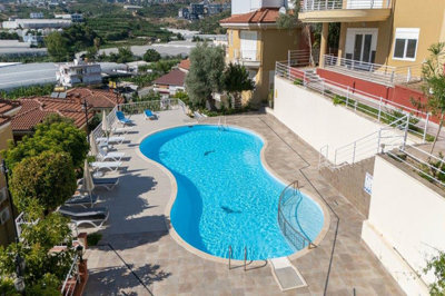 Ready-To-Move Investment Property For Sale In Alanya - Shared swimming pool