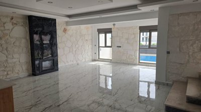 Modern Riverside Villa For Sale In Belek With A Private Pool - Spacious open-plan living area