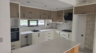 Modern Riverside Villa For Sale In Belek With A Private Pool - Generously sized American kitchen