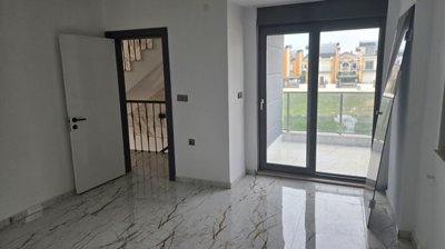 Modern Riverside Villa For Sale In Belek With A Private Pool - Bedroom with a balcony