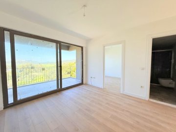 A Brand New Sunset View Apartment For Sale In Milas, Dorttepe - Lounge to the bedroom and bathroom
