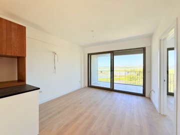 A Brand New Sunset View Apartment For Sale In Milas, Dorttepe - Access to the private balcony