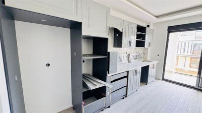 Newly Built Apartments For Sale In Belek - Modern fully fitted kitchen with balcony