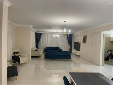 Opulent Villa With A Private Pool & Garden For Sale in Belek - Dining area to the lounge