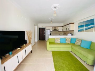 Immaculate Apartment For Sale In Altinkum – Lounge to the kitchen