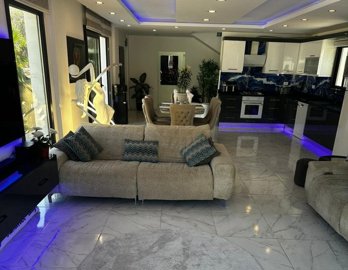 Detached Stone Villa Near Seydikemer For Sale - Luxurious open-plan living area