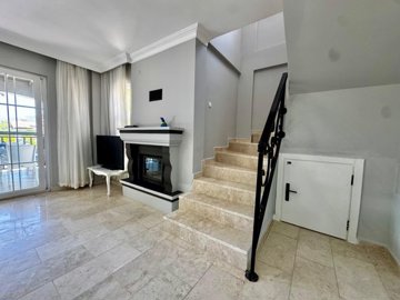 Rural Detached Villa For Sale Near Seydikemer - Fireplace and staircase to the upper floor