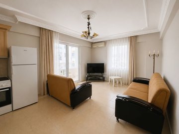 Great Value Apartment For Sale In Altinkum – From the kitchen to the lounge