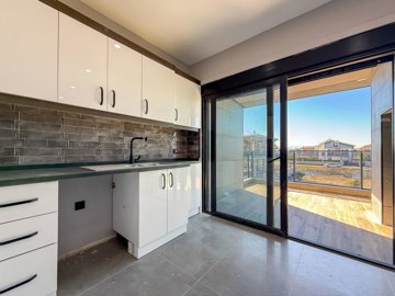 Incredible Belek Apartment In Antalya For Sale - Kitchen with access to a balcony