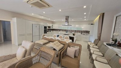 Opulent Belek Villa With A Private Pool & Spa Facilities For Sale Near Golf Courses - Lounge to the kitchen