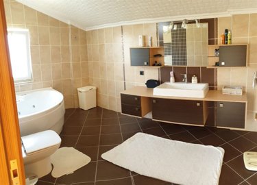 Charming Villa For Sale In Antalya - Modern bathroom with a jacuzzi bathtub