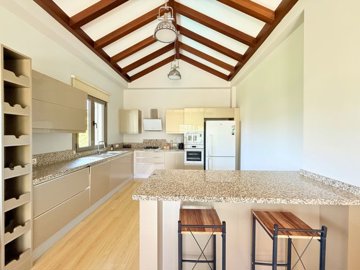 Flawless Property For Sale In Yalikavak - Kitchen with a breakfast bar