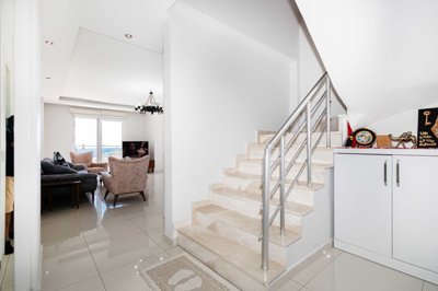 Sea & Castle View Alanya Penthouse For Sale - Looking into the lounge and the staircase