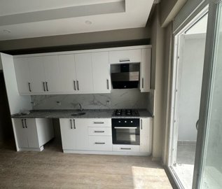 Modern Apartment For Investment In Belek, Antalya For Sale - Great size kitchen with balcony access