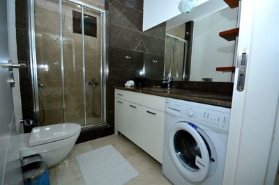 Sizeable Villa For Sale In Belek, Antalya - Modern shower room with storage