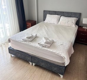 Renovated Belek Apartment In Antalya For Sale - Double bedroom with a balcony