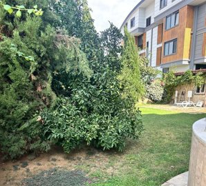 Renovated Belek Apartment In Antalya For Sale - Lush green gardens