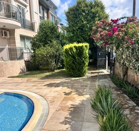 Renovated Belek Apartment In Antalya For Sale - Communal pool and sunbathing terraces