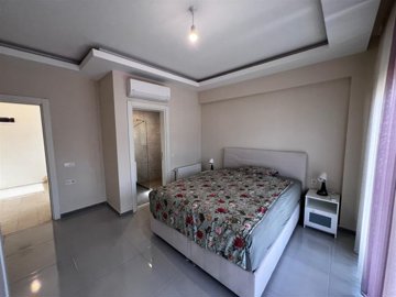 Appealing Villa For Sale in Antalya - Spacious bedroom with an ensuite shower room
