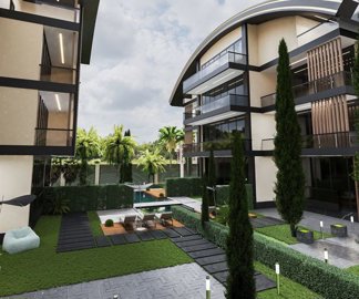 Residential Apartments For Sale In Belek - Landscaped gardens around the pool