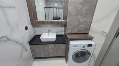Newly Built Triplex Villas In Antalya For Sale - Neat vanity with washing machine
