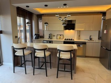 Striking Villa For Sale In Belek, Antalya With A Private Pool - Stylish kitchen with a breakfast bar