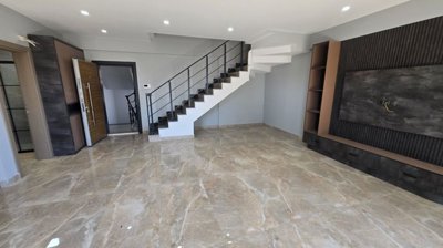 Appealing Belek Apartment In Antalya For Sale - Lounge to the bathroom and staircase