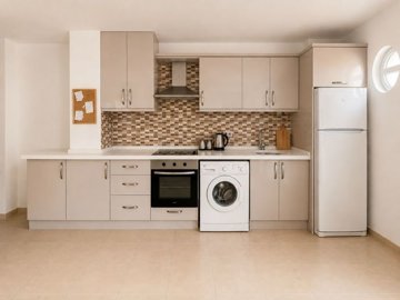 Apartment With Nature Views For Sale In Hisar, Didim - Modern kitchen, fully fitted with white goods