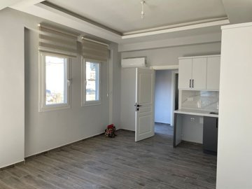 Lovely Ground-Floor Apartment For Sale In Seydikemer - Living room with an open-plan design