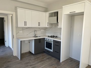 Lovely Ground-Floor Apartment For Sale In Seydikemer - Fully installed kitchen with built-in appliances