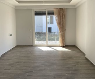 Lovely Ground-Floor Apartment For Sale In Seydikemer - Lounge with terrace access