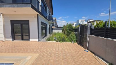 Brand New Villa Investment For Sale In Antalya - Large sun terrace around the pool