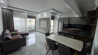 Must-See Belek Property Near Beaches & Golf Courses For Sale - Lounge to the American style kitchen