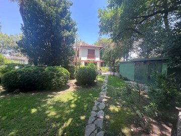 Beautiful Villa For Sale In Tranquil Dalyan - Garden with a storage building