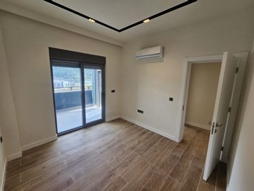 Tasteful Newly-Built Antalya Property for Sale Near The Beach - Bedroom with balcony
