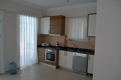 Blissful Villa For Sale Near Golf Courses & Beaches In Belek - Kitchen with exterior access