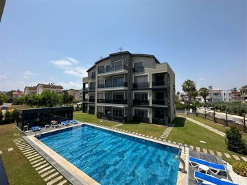 Belek Garden Apartment In Antalya For Sale - Main view of the complex and communal pool