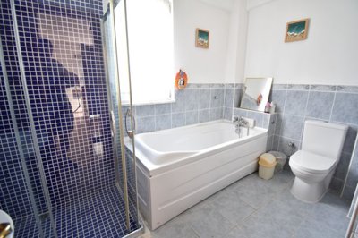 Detached Villa In Uzumlu, Fethiye For Sale - Modern bathroom with a bathtub