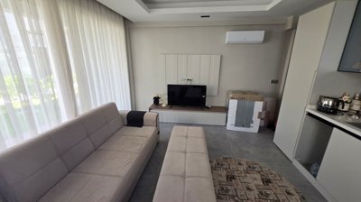 Garden-Floor Apartment In Belek For Sale With A Pool & Social Facilities - Lounge and kitchen