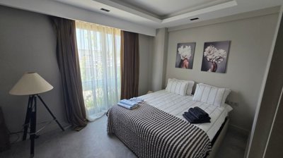 Garden-Floor Apartment In Belek For Sale With A Pool & Social Facilities - Generous sized double bedroom