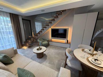 Divine Apartment For Sale With On-Site Luxury Facilities - Lounge area and stylish staircase