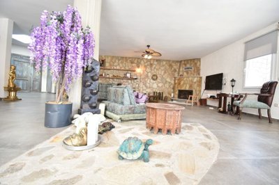 Luxury Bespoke Bungalow For Sale In Uzumlu - Beautiful interior spaces with feature  stone wall
