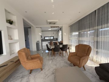 Blissful 4-Bedroom Villa For Sale In Belek With A Private Exterior & Pool - Open-plan living area and kitchen