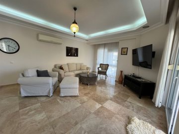 Furnished Apartment In Belek For Sale - Lounge with balcony access