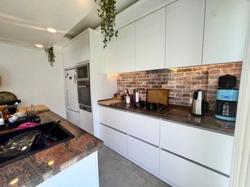 Upscale Detached Villa In Fethiye For Sale - Modern fully fitted kitchen with built-in white goods