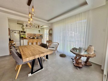 Upscale Detached Villa In Fethiye For Sale - Dining area through to the kitchen