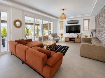 Upscale Detached Villa In Fethiye For Sale - Lounge with terrace and pool access