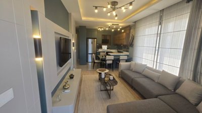 Key-Ready 1-Bedroom Apartment For Sale In Antalya - Elegant open-plan living area